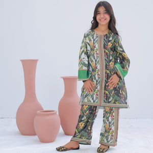 Girl wearing Zardham White & Sage embroidered kurta with sage green trousers, front view