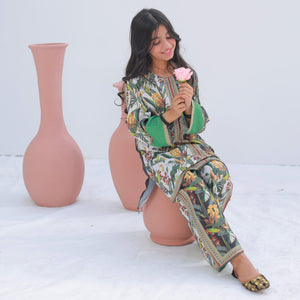 White & Sage three-piece set by Zardham, three-quarter angle on young model