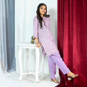 Girl wearing Zardham Soft Lilac embroidered kurta and trouser set, full front view