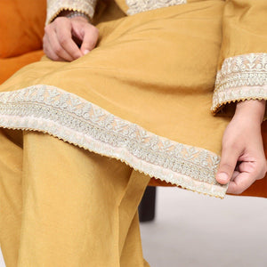 Detail of the Nayra raw silk embroidery and neckline, Zardham women's collection