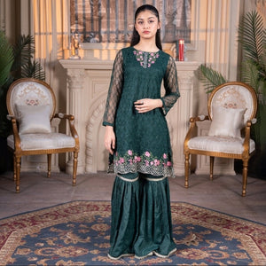 Model wearing Zardham – Trendy Clothing for Girls & Women bottle green net sharara suit with pink floral embroidery.