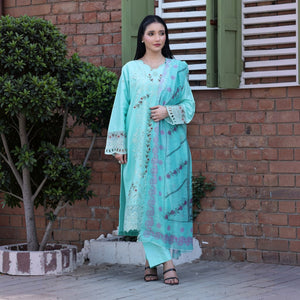 Zariya - Zardham – Trendy Clothing for Girls & WomenWomen's ClothingModel wearing Zardham – Trendy Clothing for Girls & Women mint green cotton suit with sequin embroidery and dupatta.