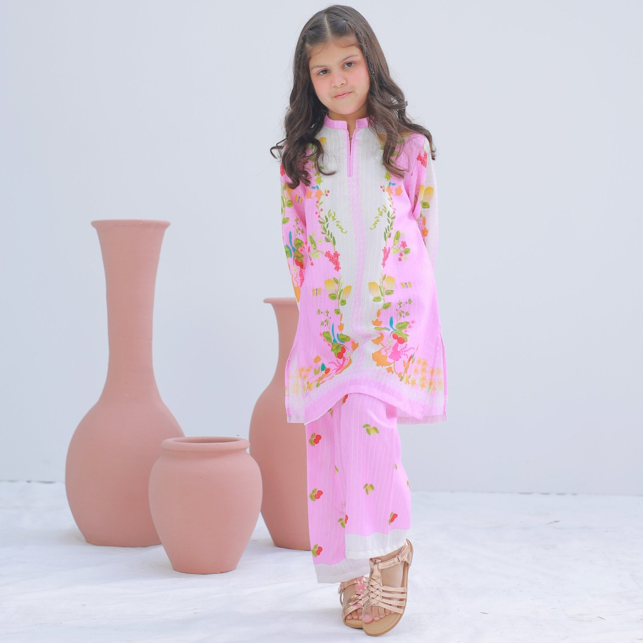 Girl wearing Zardham Blush Pink embroidered kurta with matching trousers and dupatta, full front view