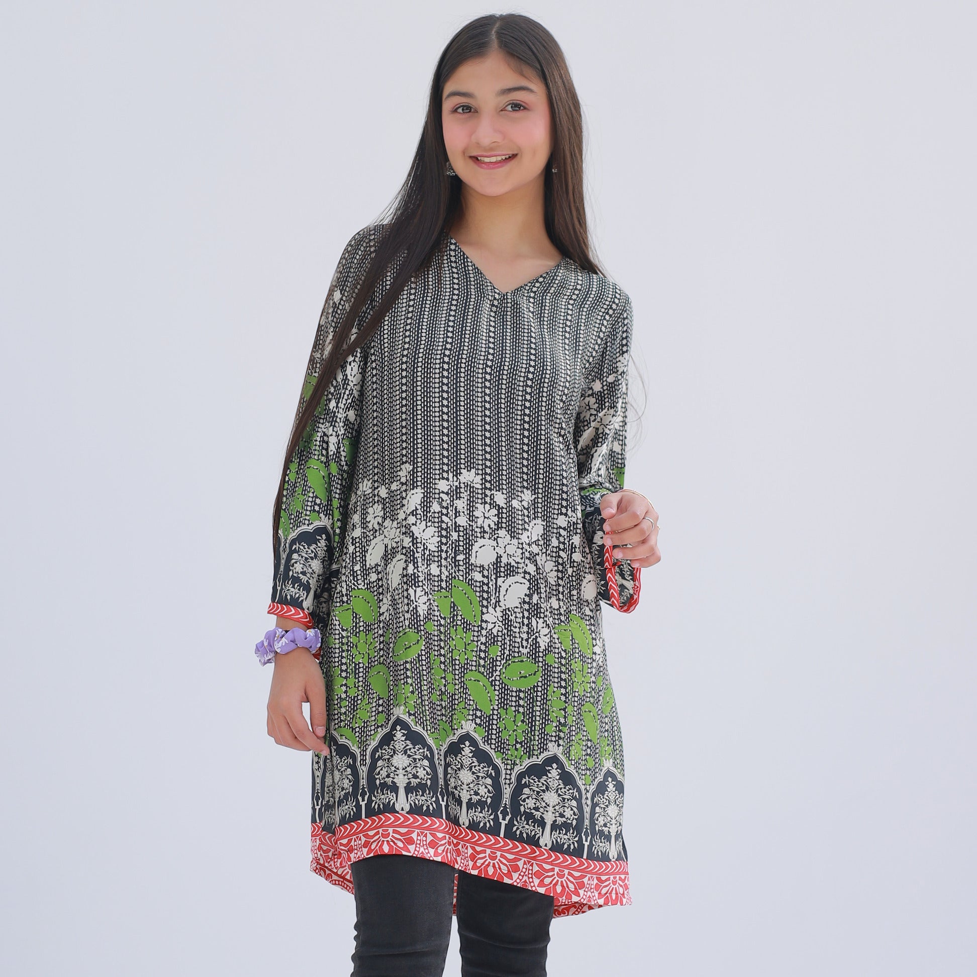 Girl wearing Zardham Signature Printed Kurti with matching trousers, full front view