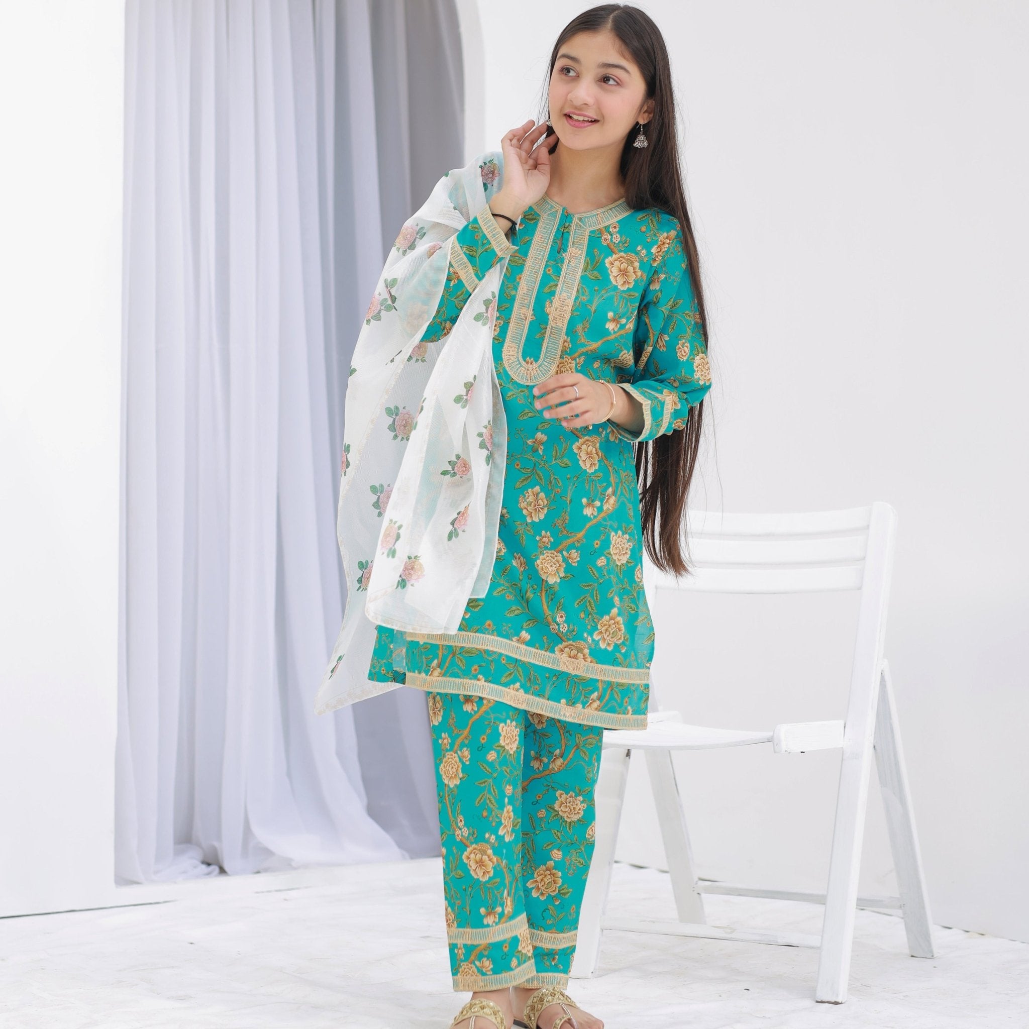 Girl wearing Zardham Ferozi Mist turquoise embroidered kurta set, full front view
