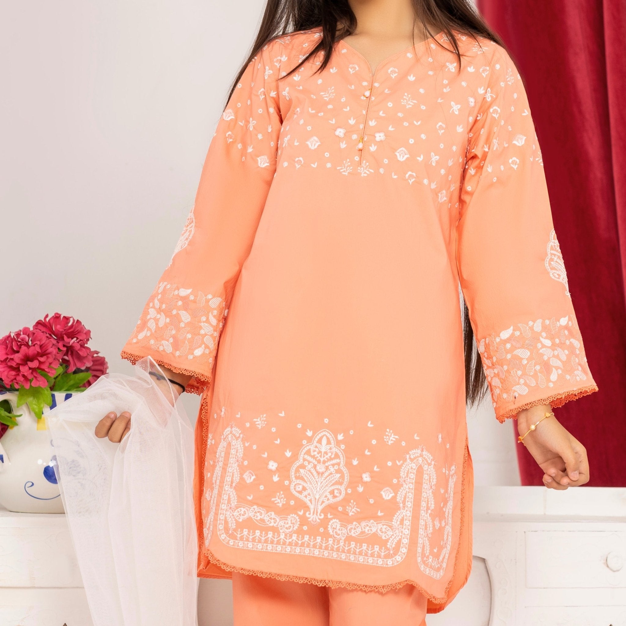 Zardham Blush Coral kurta set, three-quarter standing pose on young model