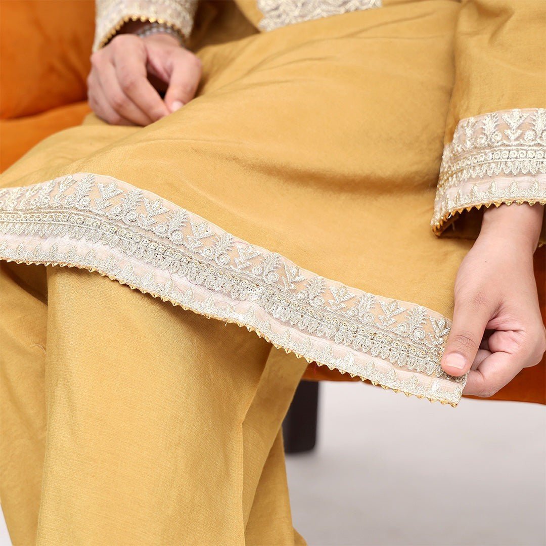 Detail of the Nayra raw silk embroidery and neckline, Zardham women's collection