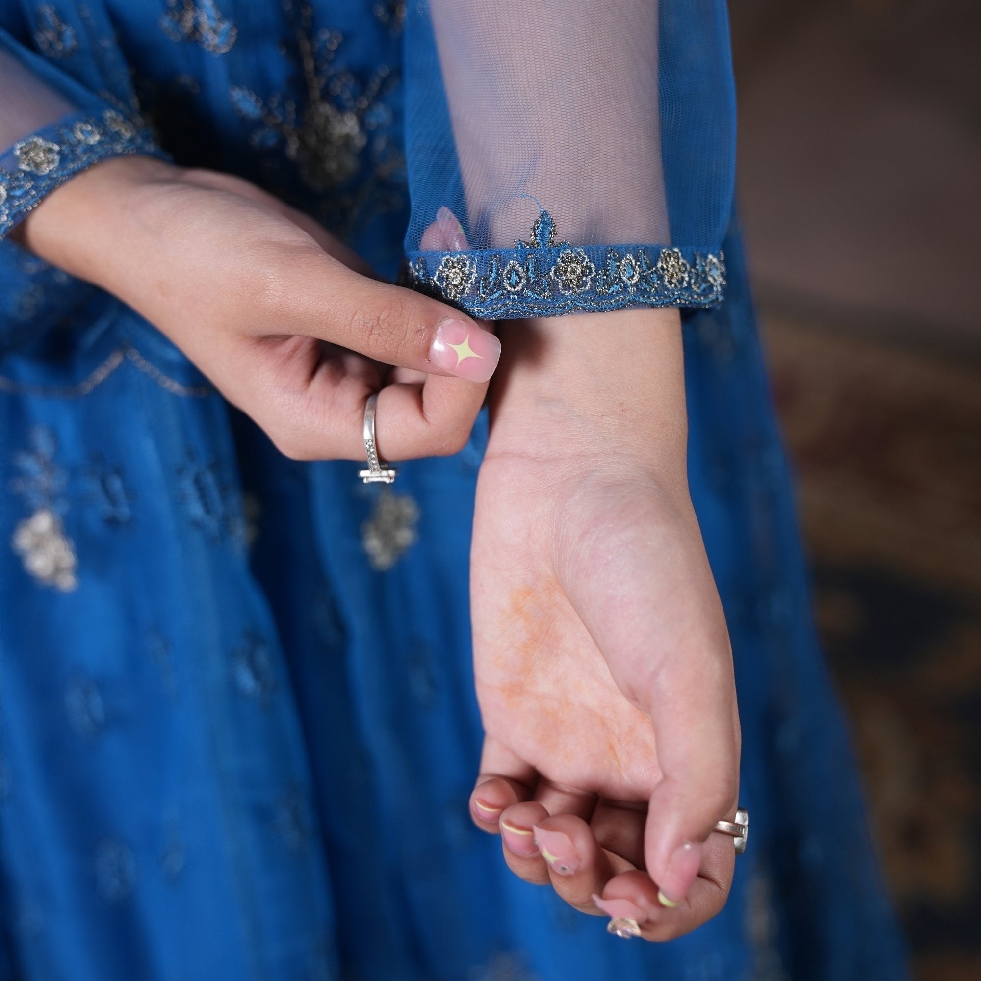 Zardham – Trendy Clothing for Girls & Women royal blue net Anarkali frock with intricate gold and silver embroidery.