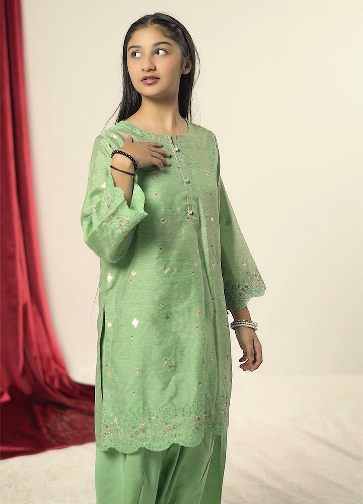 Girl wearing Zardham Sage Green Tilla embroidered kurta set, full front view