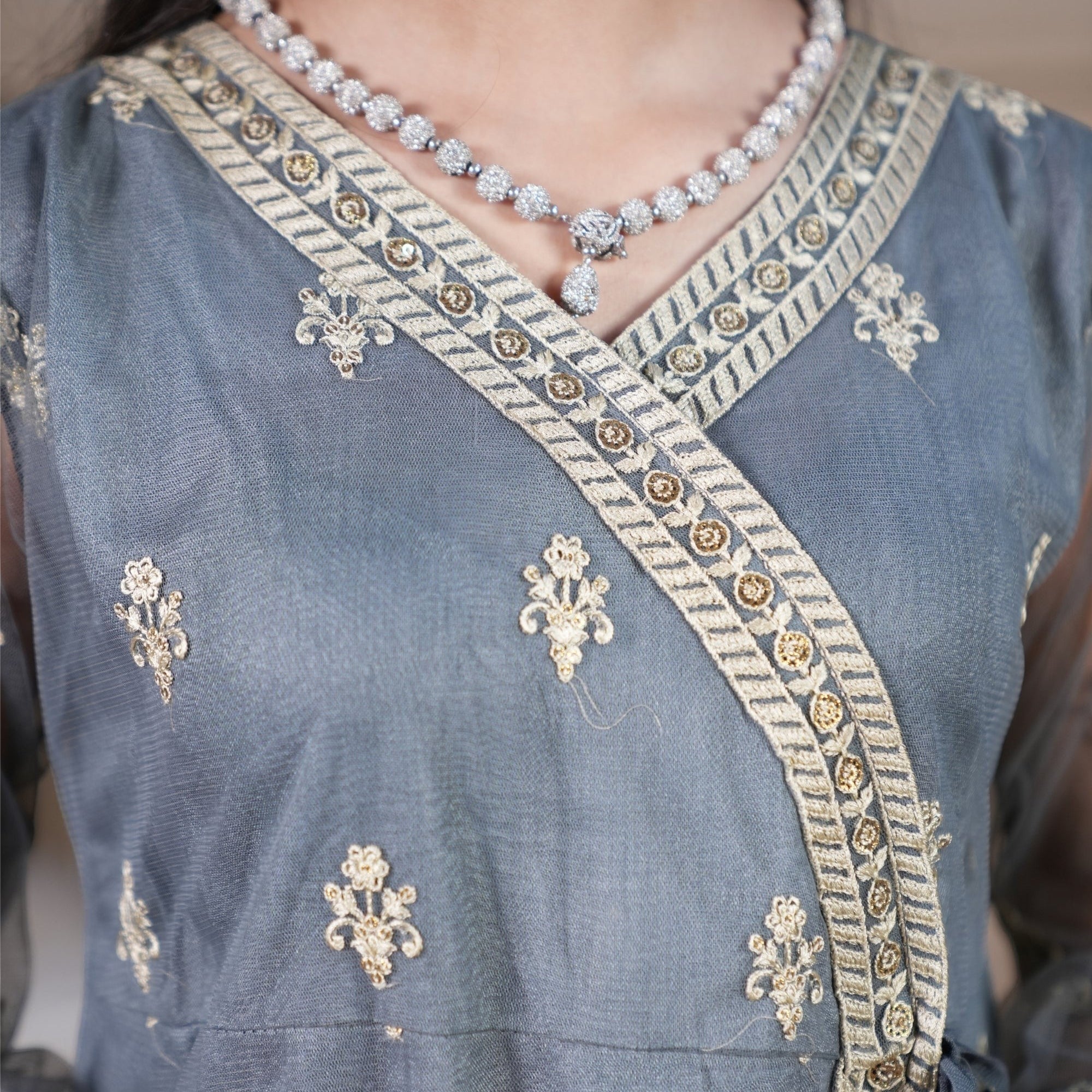 Zardham – Trendy Clothing for Girls & Women slate grey raw silk Angrakha kurta with gold floral embroidery and lace.