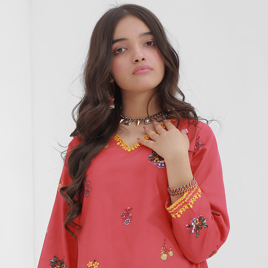 Crimson Red - Zardham – Trendy Clothing for Girls & WomenGirls' ClothingZardham – Trendy Clothing for Girls & Women red embroidered kurta with sequin details and V-neck worn by a young woman